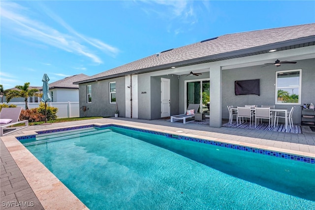 view of pool featuring a patio area and ceiling fan