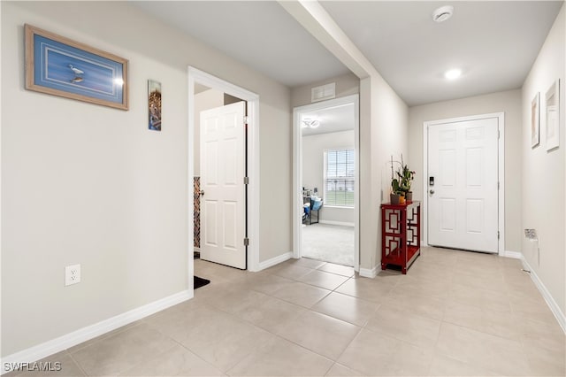 view of tiled foyer entrance