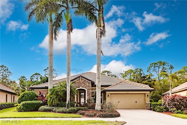 view of front of home with a garage