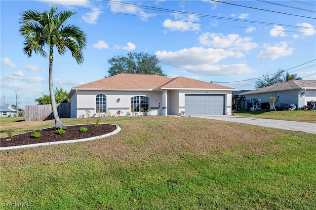 ranch-style home featuring a front lawn and a garage