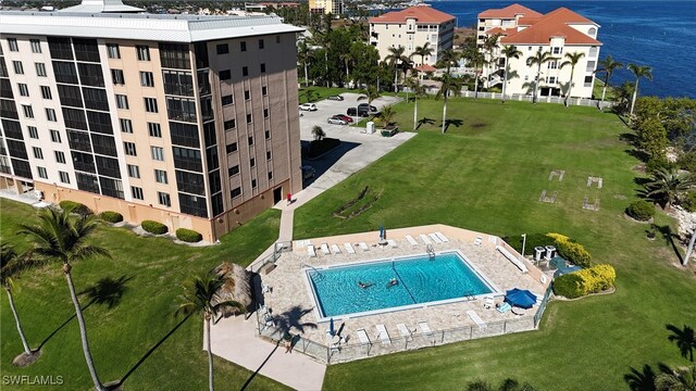 birds eye view of property featuring a water view