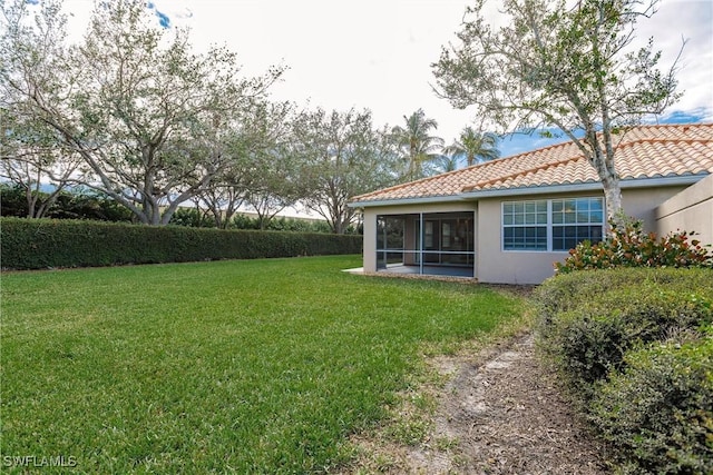 4747 San Carlo Ct, Naples, FL 34109 - view of green lawn featuring a sunroom