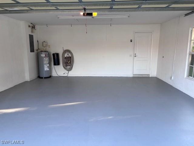 4747 San Carlo Ct, Naples, FL 34109 - garage featuring water heater and electric panel