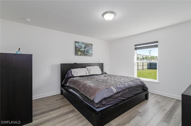 bedroom featuring light hardwood / wood-style floors