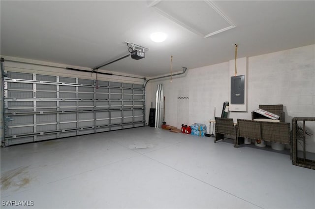 garage with electric panel and a garage door opener