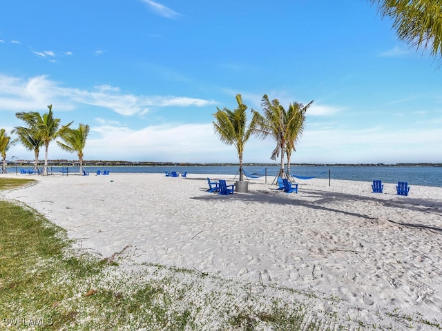 property view of water featuring a beach view