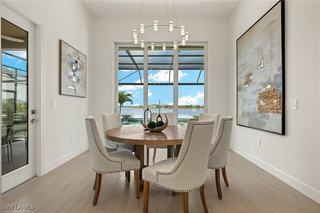 dining room with a water view