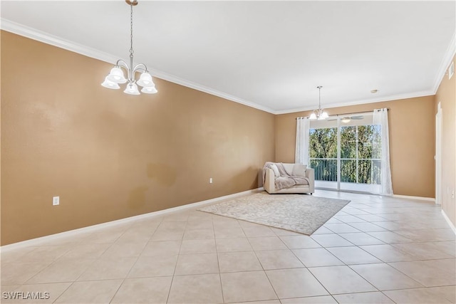 unfurnished room with ornamental molding, light tile patterned floors, and a chandelier