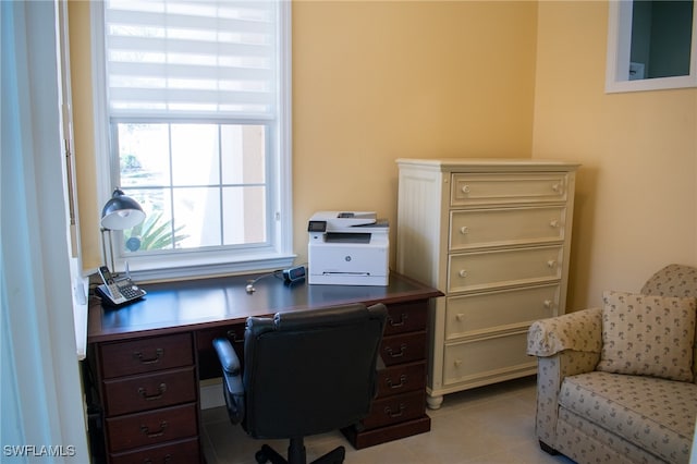 office space with light tile patterned floors