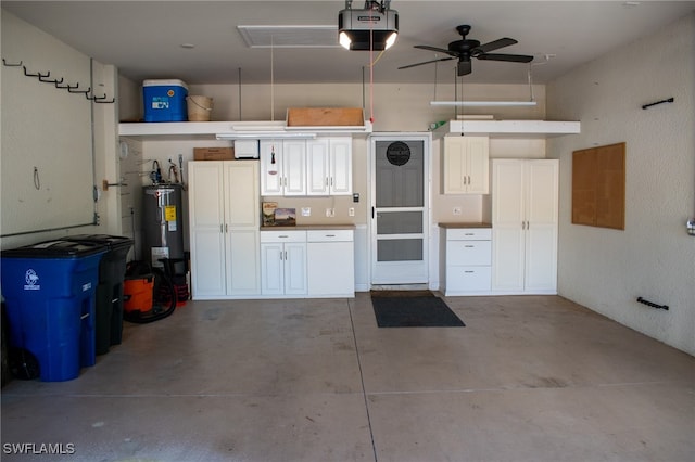 garage featuring ceiling fan, a garage door opener, and water heater