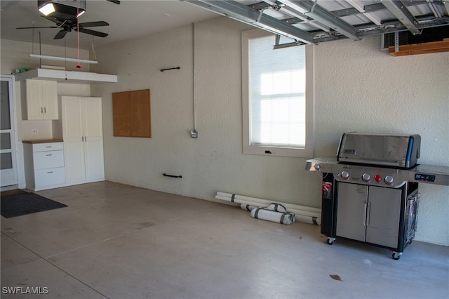 garage with ceiling fan