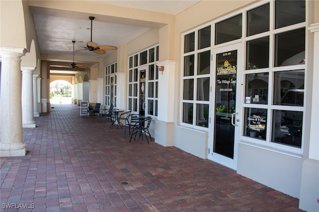 view of patio with ceiling fan and french doors