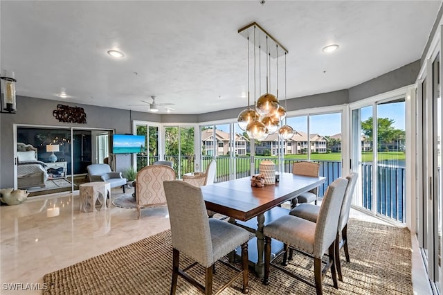 dining area with ceiling fan