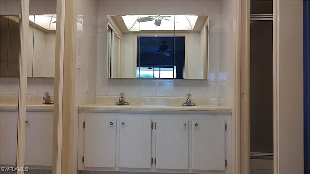 bathroom featuring backsplash and vanity