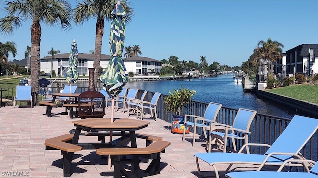 view of patio featuring a water view