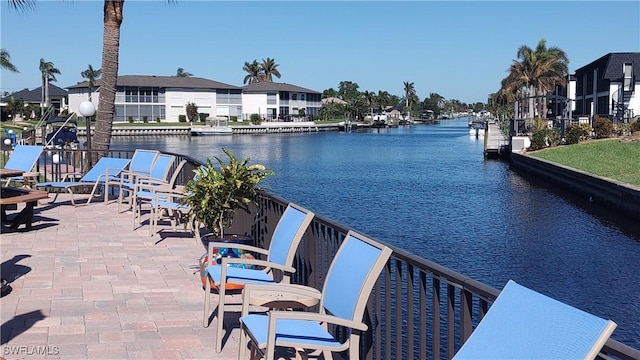 view of pool with a water view