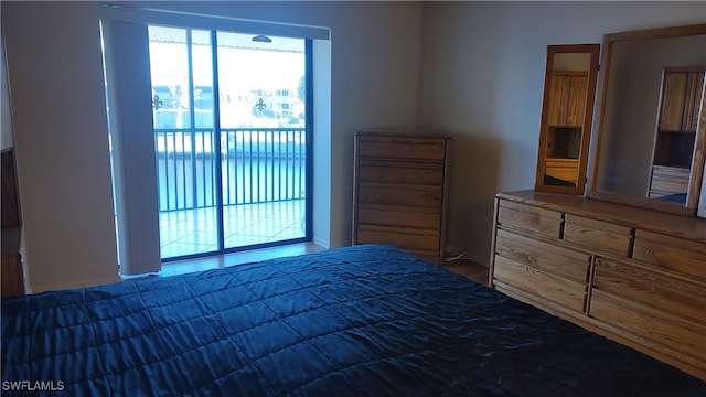 bedroom with access to outside