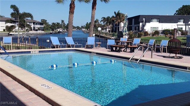 view of pool featuring a patio area