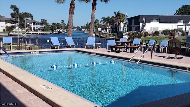 view of swimming pool with a patio area