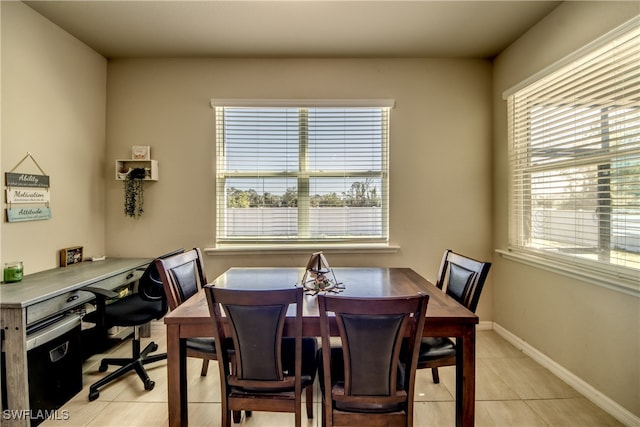 view of tiled dining space