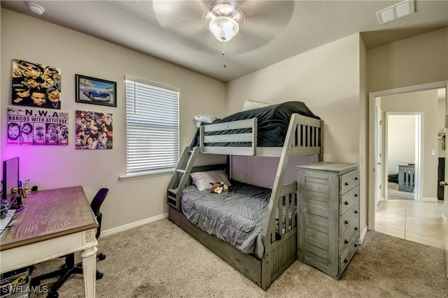 bedroom with light carpet and ceiling fan