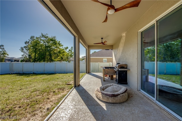 view of patio / terrace with grilling area and ceiling fan