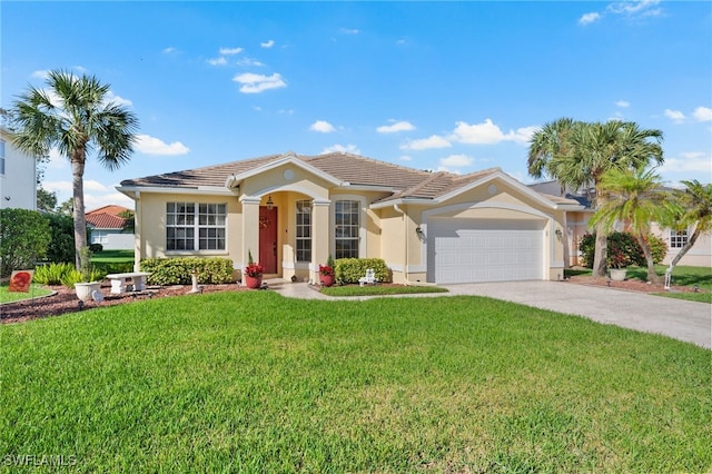 view of front of house with a front lawn and a garage