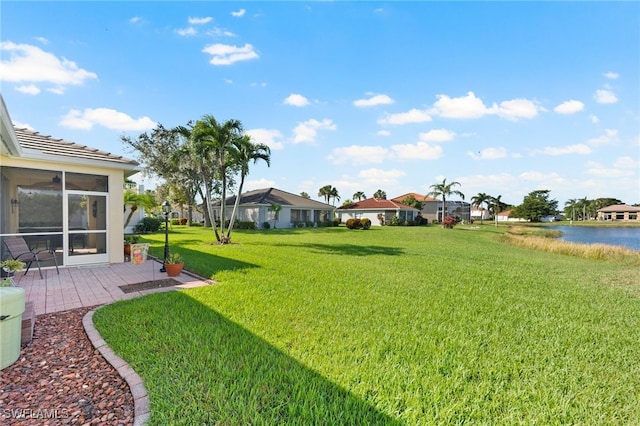 view of yard with a water view