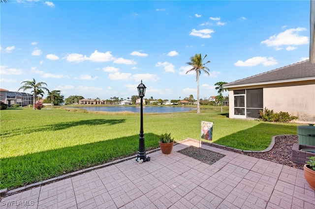 view of patio with a water view