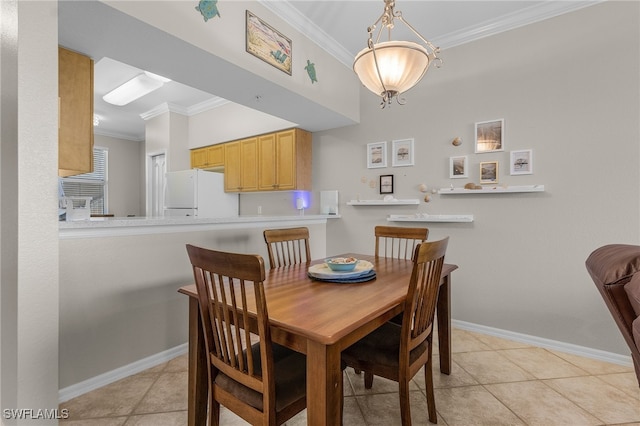 tiled dining area with ornamental molding