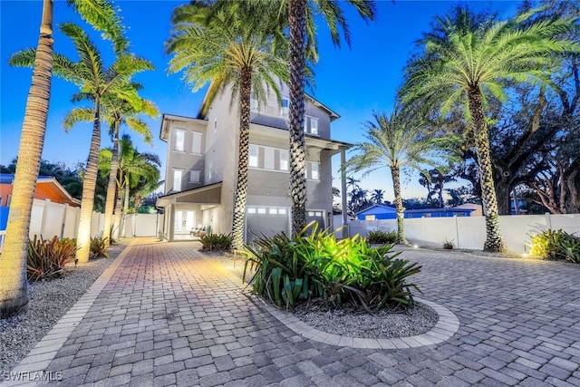 view of front of property with a garage