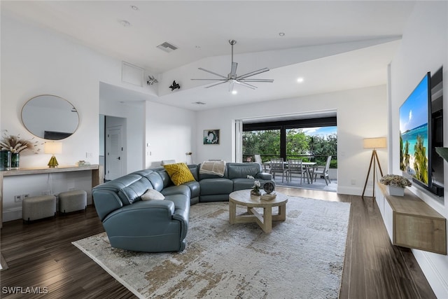 living room with ceiling fan, high vaulted ceiling, and dark wood-type flooring