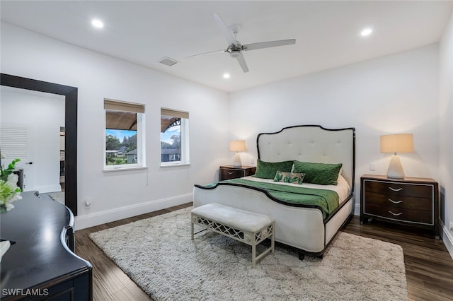 bedroom featuring ceiling fan and dark wood-type flooring