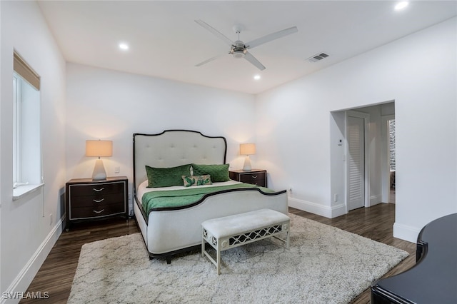 bedroom featuring ceiling fan and dark wood-type flooring