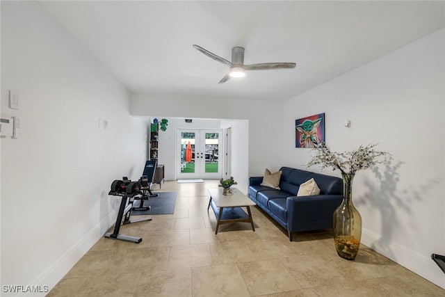 living room with ceiling fan and french doors