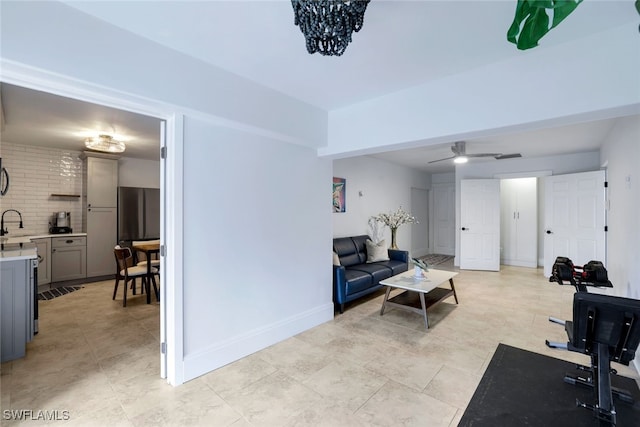 workout room with ceiling fan