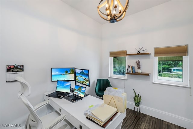 office area featuring dark hardwood / wood-style flooring and an inviting chandelier