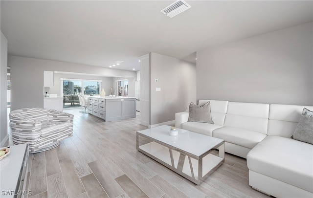 living room with light wood-type flooring