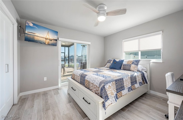 bedroom featuring ceiling fan and light hardwood / wood-style floors