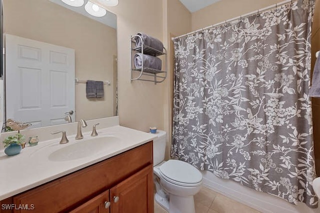 full bathroom featuring tile patterned floors, vanity, shower / tub combo, and toilet