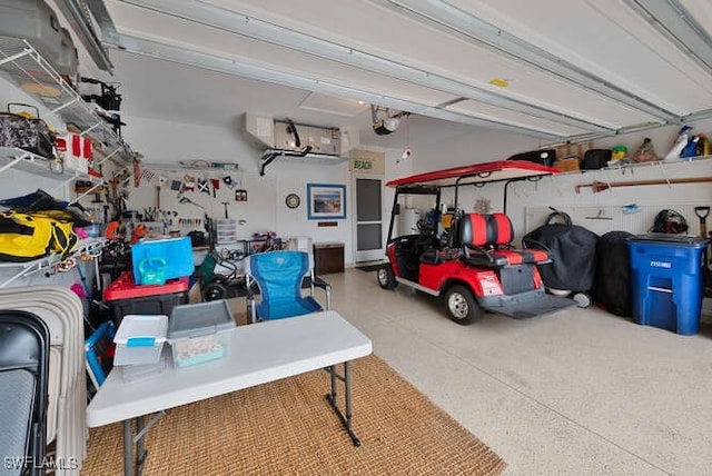 garage featuring a garage door opener