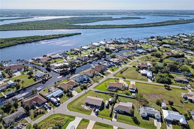 drone / aerial view featuring a water view