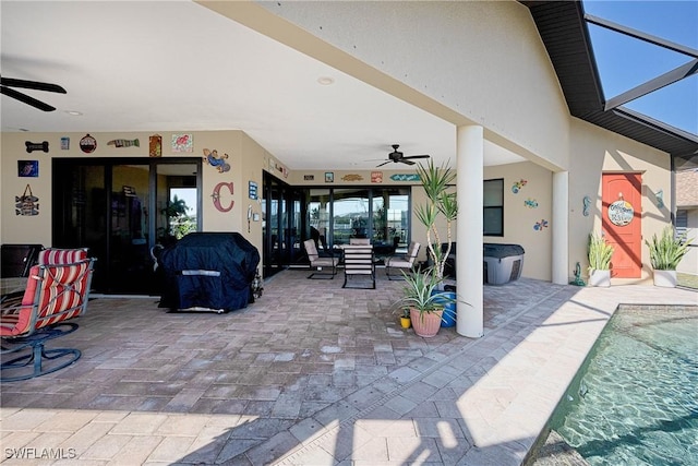 view of patio / terrace featuring ceiling fan