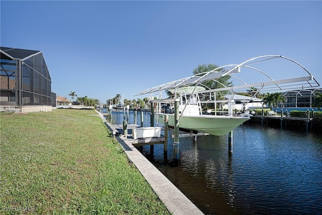 view of dock featuring a lawn, glass enclosure, and a water view