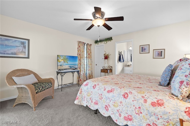 bedroom with ceiling fan, ensuite bathroom, and carpet floors