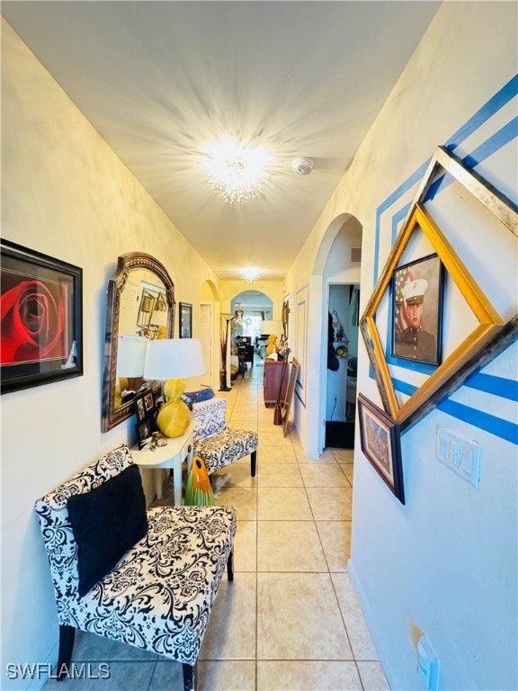 hallway with light tile patterned floors