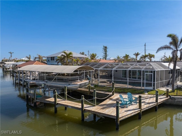 dock area with a water view and a lanai