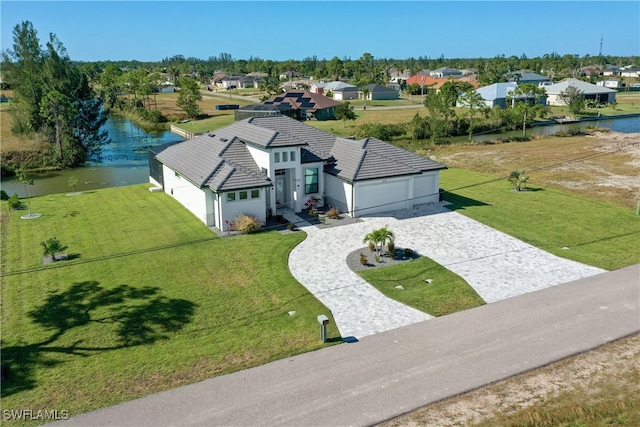 aerial view featuring a water view