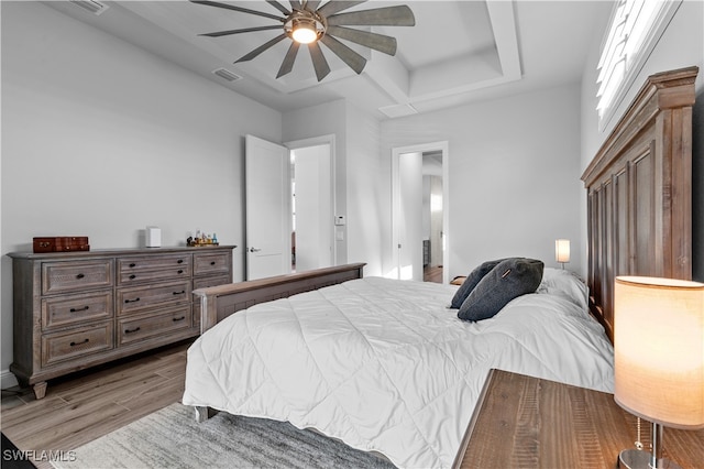 bedroom featuring light hardwood / wood-style floors and ceiling fan