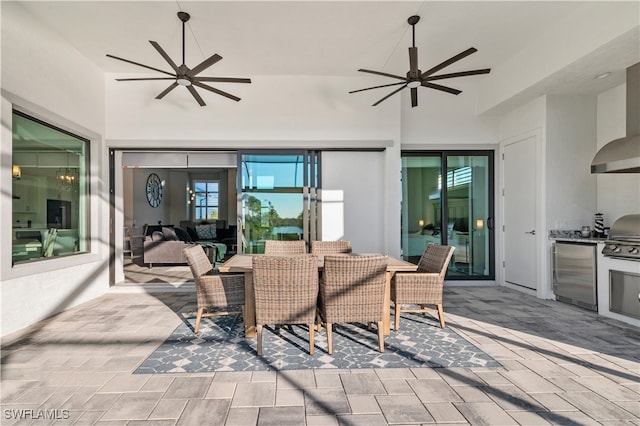 view of patio / terrace featuring area for grilling and ceiling fan